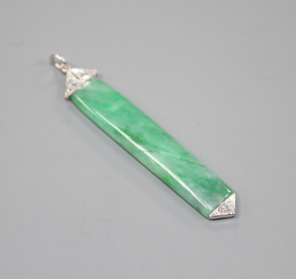 A 1920s style white metal mounted, jade and diamond pendant, overall 38mm, gross weight 1.7 grams.
